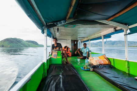 Two men sitting in the boatのeditorial素材