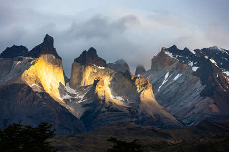 Breathtaking view of Torres del Paine lighted by the sunsets last sun rays, Torres del Paine National Park, southern Chilean Patagoniaの写真素材