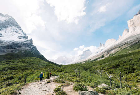 TORRES DEL PAINE NATIONAL PARK, CHILE - JANUARY 23, 2019: A group of hikers in the French valley, Torres del Paine National Park, Chileのeditorial素材