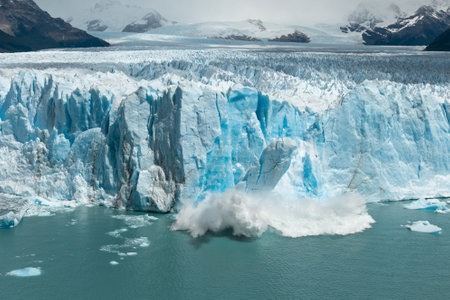 Large chunk of ice is breaking off the Perito Moreno Glacier, Los Glaciares National Parkの写真素材