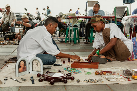 BANGKOK, THAILAND - MAY 3, 2014: Two men play chess on the groundのeditorial素材