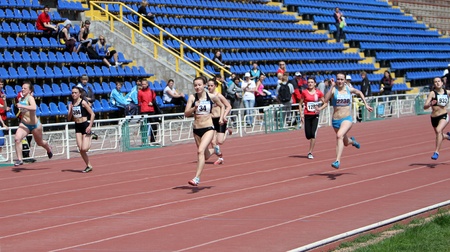 YALTA, UKRAINE - APRIL 25  Unidentified girls age 16-17 on the 100 meters race on Ukrainian Junior Track and Field Championships on April 25, 2012 in Yalta, Ukraine  のeditorial素材