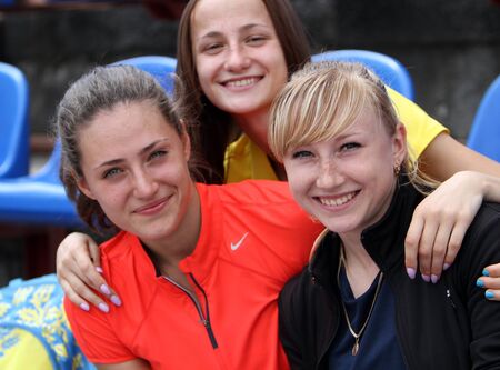  Kolesnichenko Olena with friends after the 400 meters hurdles race on Ukrainian Track   Field Championships on June 01, 2012 in Yalta, Ukraineのeditorial素材