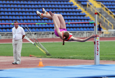 Biruk Tamara wins high jump under the rain on Ukrainian Track & Field Championships on June 01, 2012 in Yalta, Ukraineのeditorial素材