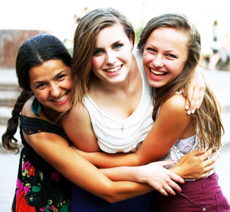 Students girls having fun outsideの写真素材