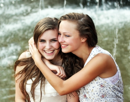 Students girls having fun outsideの写真素材