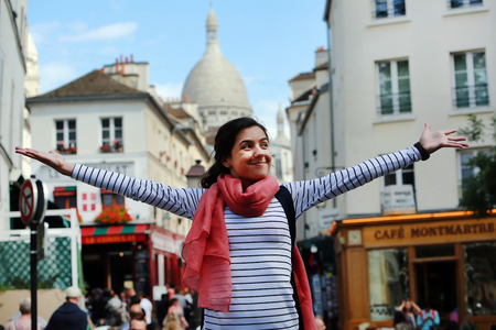 Happy beautiful girl on Montmartre in Parisのeditorial素材