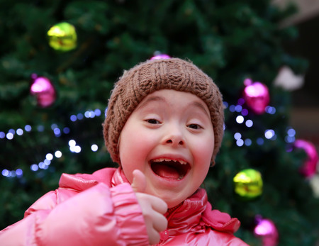 Portrait of beautiful young happy girlの写真素材