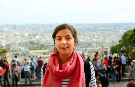 Happy beautiful girl on Montmartre in Parisの写真素材