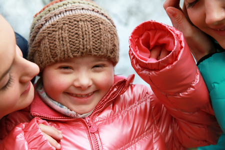 Happy family moments - Young girls having fun in the cityの写真素材