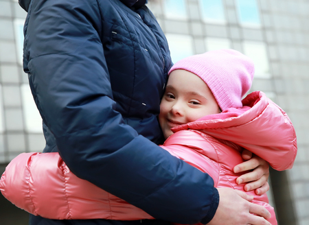 Happy family moments - Young girls having fun in the cityの写真素材