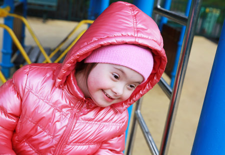 Portrait of beautiful girl on the playground
