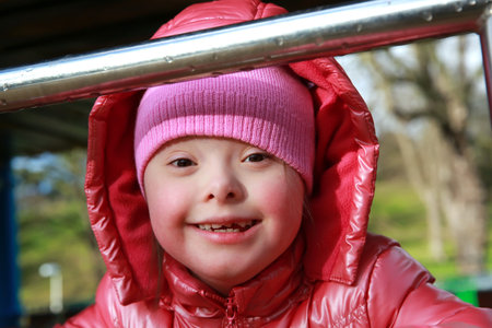 Portrait of beautiful girl on the playground