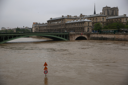 Seine river flood in Paris on june 02, 2016 in Paris, France. The rising waters of the Seine overflowed riverbanks, roads and rail tracks across Parisのeditorial素材