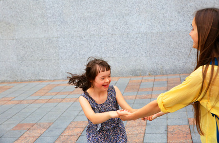 Happy family moments in the city.の写真素材