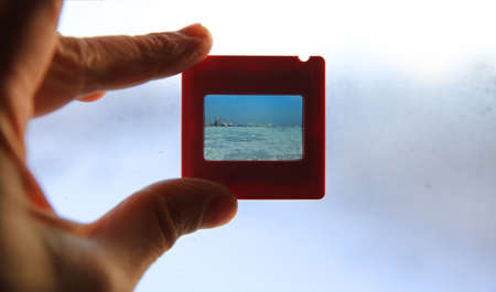 Photo slide in the handの写真素材