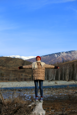 Beautiful teenage girl have fun in the mountainsの写真素材