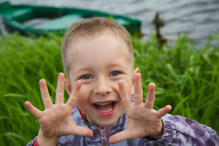 Cute smiling little boy outdoors