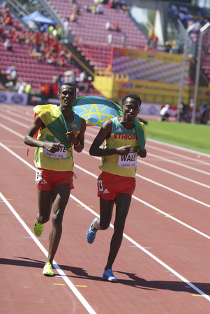 TAMPERE, FINLAND,  July 15: TAKELE NIGATE and GETNET WALE from Ethiopia win gold and bronze medals in the 3000 meters STEEPLECHASE on IAAF World U20 Championship Tampere, Finland 15th July, 2018.のeditorial素材