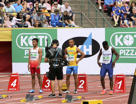 TAMPERE, FINLAND, July 11: LALU MUHAMMAD ZOHRI (Indonesia),VASYL MAKUKH (Ukraine),RIKKOI BRATHWAITE  (IVB) in 100 m. Semi-Final on the IAAF World U20 Championship in Tampere, Finland 11 July, 2018.のeditorial素材