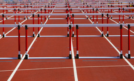 Hurdles on competition background