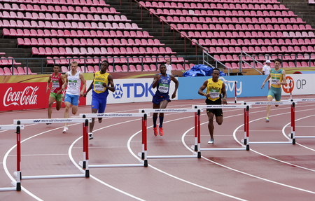 TAMPERE, FINLAND, July 12: Athlets running 400 metrs hurdles heats on the IAAF World U20 Championship in Tampere, Finland 12 July, 2018.のeditorial素材