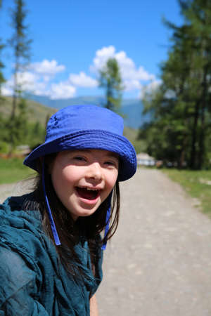 Little girl have fun in the mountainsの写真素材