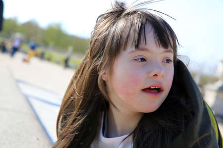 Portrait of a little girl in the parkの写真素材