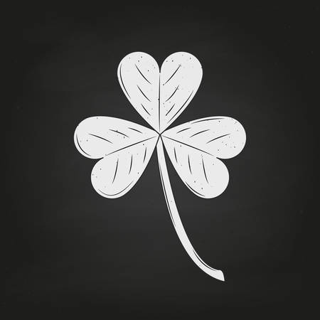 White Shamrock clover isolated on chalkboard background. Clover in vintage style. Vector illustrationのイラスト素材