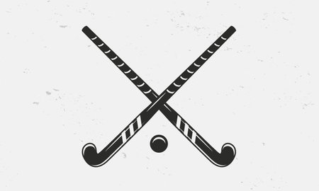 Grass hockey sticks and ball icons. Field hockey icon isolated on white background. Crossed Grass hockey sticks. Vintage design elements for logo, badges, banners, labels. Vector illustrationのイラスト素材
