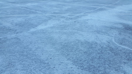 Snow-covered asphalt. snow covered road. Field covered with snowの写真素材