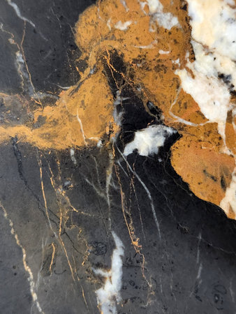 Black marble with veins. Black marble texture. Marble background