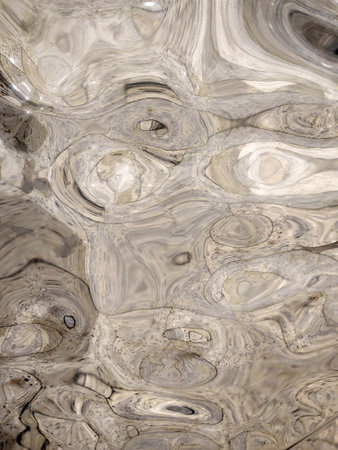 Uneven glass surface. Glass background with irregularitiesの写真素材