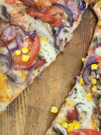 Pizza. Pizza slices on a wooden table