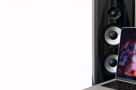 sound speaker and laptop with free space on white background.の写真素材