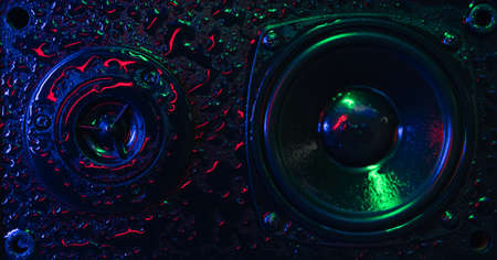 concept of powerful sound speakers in colorful neon light with waterの写真素材