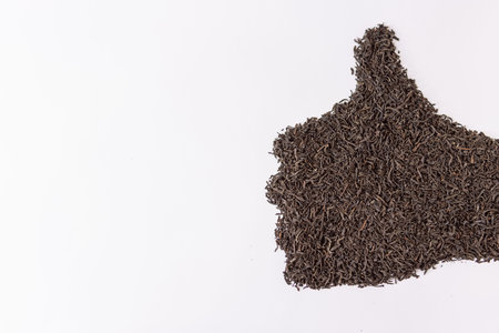 hand is drawn with tea leaves, on the left there is a place for