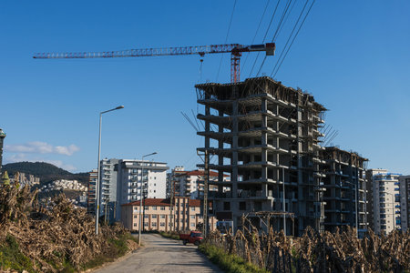photo of a building that is being built . Photo from bottom to top