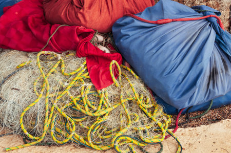 fishing accessories, fish nets and backpacks with accessories close-up