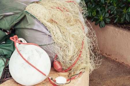 fishing accessories, fish nets and backpacks with accessories close-up