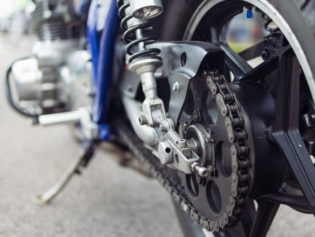 shock absorber and spring closeup on racing car isolated