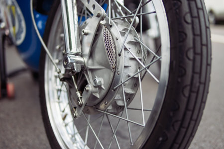 new motorcycle with metal parts and big wheels, bottom view