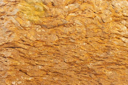 texture of yellow stones close-up there is a place for an inscription