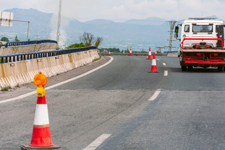 passing road under repair with special special equipment on the track