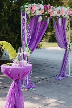 Wedding arch. Beautiful Wedding Ceremony. wedding ceremony violet colorの写真素材