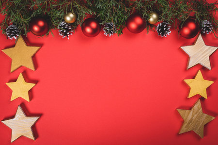 Christmas and New Year holidays. background. Christmas card with copy space. Stylish branding mockup to display your artworks. Cute vintage christmas new year gifts mock up on red background. Close upの写真素材