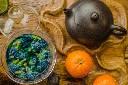 Organic blue tea Anchan in a teapot and a cups