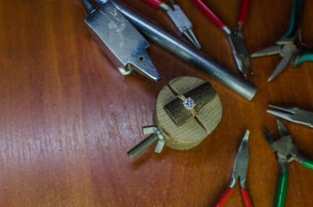 Desktop for craft jewellery making with professional tools. Copy spaceの写真素材