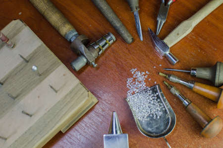 Desktop for craft jewellery making with professional tools. Copy spaceの写真素材
