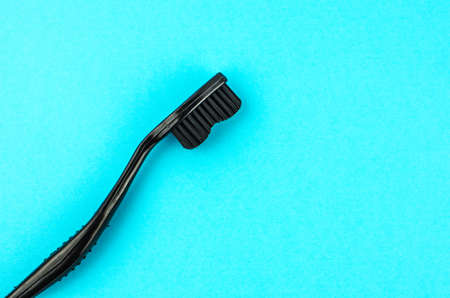 toothpaste and brush on a blue background with place for text. Health, cleanliness and beautyの写真素材